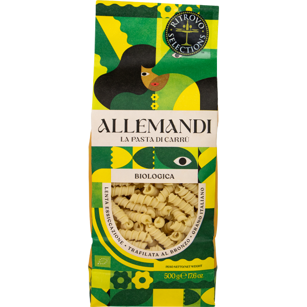 Pasta package with green and yellow design featuring a stylized face, labeled 'Allemandi'.