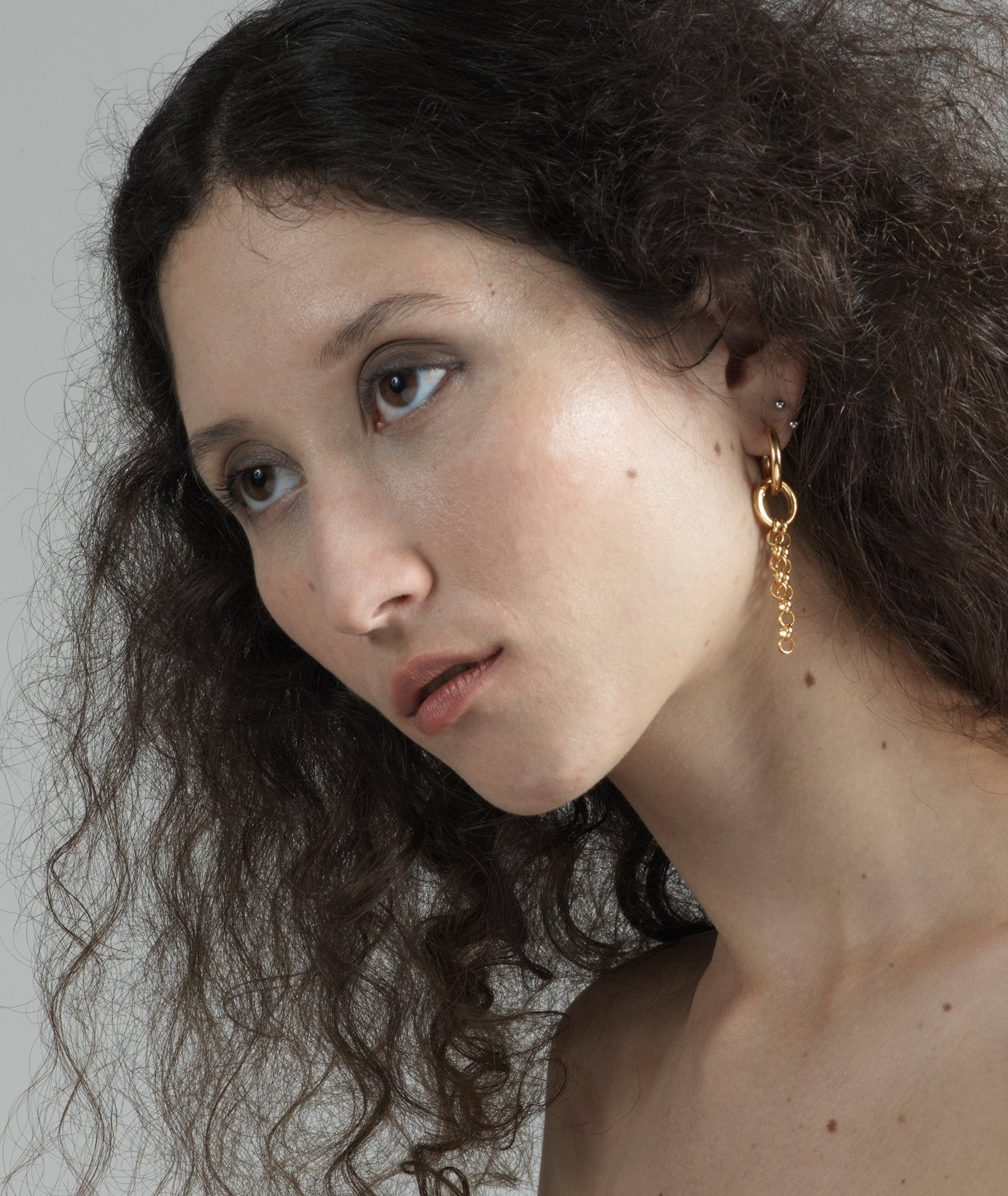 Motion Gold Earring
